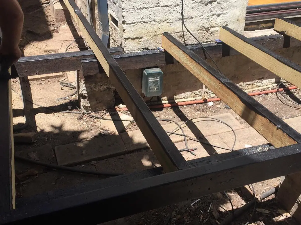 Joist tape capping every bearer before the boards go down